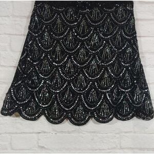 Black and silver sequin skirt size Medium. NWOT
